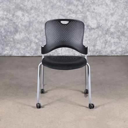 Herman Miller Caper Stacking Chair Black Plastic with Arms with Wheels