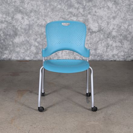 Herman Miller Caper Stacking Chair Turquoise Plastic No Arms with Wheels